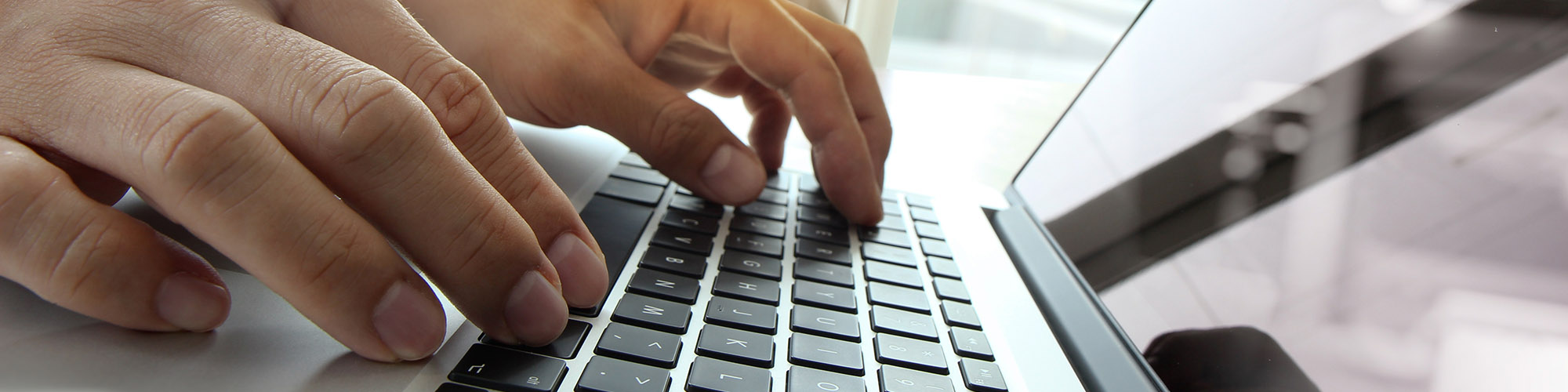 Man Using a Laptop